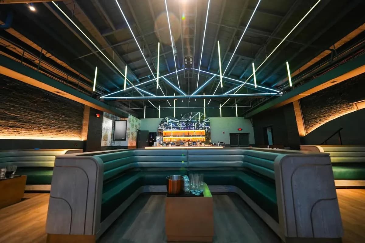 Mr. Ivy venue wider angle — teal LED lounge and booth seating by Treacy Brothers